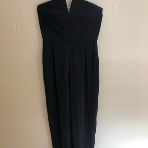 Beautiful black pant suit on the formal side